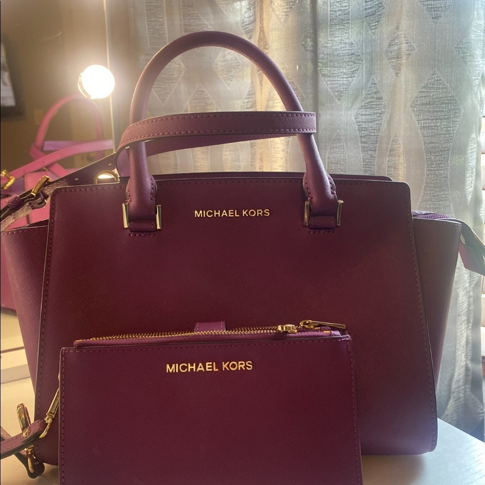 Plum purple wrist wallet.